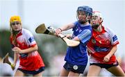 21 June 2025; Nicole Griffin of Kilmaley in action against Sive Finnerty of Mungret St Paul's during the John West Féile na nGael Camogie and Hurling National Finals match between Kilmaley and Mungret St Paul's at Hailo Tiles Wexford GAA Centre of Excellence in Ferns, Wexford. Photo by Shauna Clinton/Sportsfile