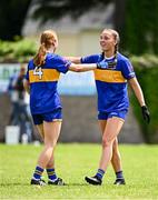 21 June 2025; Tipperary players Nora Martin, right, and Emma Cronin after their side's victory in the TG4 All-Ireland Ladies Football Senior Championship Group 1 match between Tipperary and Donegal at Canon Hayes Park in Bansha, Tipperary. Photo by Seb Daly/Sportsfile