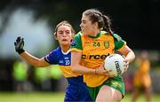 21 June 2025; Ava Walsh of Donegal in action against Clara English of Tipperary during the TG4 All-Ireland Ladies Football Senior Championship Group 1 match between Tipperary and Donegal at Canon Hayes Park in Bansha, Tipperary. Photo by Seb Daly/Sportsfile