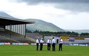 21 June 2025; Referee Jerome Henry, fourth from left, and his umpires Philip Heneghan, Liam Conlon, John Heneghan and Tom Ryder check the weather before the GAA Football All-Ireland Senior Championship preliminary quarter-final match between Kerry and Cavan at Fitzgerald Stadium in Killarney, Kerry. Photo by Brendan Moran/Sportsfile
