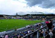 21 June 2025; The Cavan team warm up in front of a backdrop of rain coming over the Macgillycuddy's Reeks  the GAA Football All-Ireland Senior Championship preliminary quarter-final match between Kerry and Cavan at Fitzgerald Stadium in Killarney, Kerry. Photo by Brendan Moran/Sportsfile