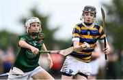 21 June 2025; Brendan McGuane of Michael Cusacks in action against Robert Kelly of Cashel King Cormacs during the John West Féile na nGael Camogie and Hurling National Finals at Hailo Tiles Wexford GAA Centre of Excellence in Ferns, Wexford. Photo by Shauna Clinton/Sportsfile