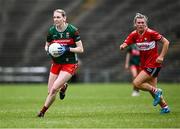21 June 2025; Nicola O'Malley of Mayo gets away from Rosie Corkery of Cork during the TG4 All-Ireland Ladies Football Senior Championship Group 2 match between Mayo and Cork at Hastings Insurance MacHale Park in Castlebar, Mayo. Photo by Piaras Ó Mídheach/Sportsfile