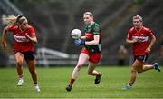 21 June 2025; Nicola O'Malley of Mayo gets away from Máire O'Callaghan, left, and Rosie Corkery of Cork during the TG4 All-Ireland Ladies Football Senior Championship Group 2 match between Mayo and Cork at Hastings Insurance MacHale Park in Castlebar, Mayo. Photo by Piaras Ó Mídheach/Sportsfile