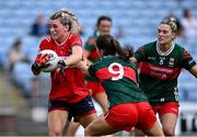 21 June 2025; Rosie Corkery of Cork in action against Mayo players Saoirse Lally, 9 and Danielle Caldwell during the TG4 All-Ireland Ladies Football Senior Championship Group 2 match between Mayo and Cork at Hastings Insurance MacHale Park in Castlebar, Mayo. Photo by Piaras Ó Mídheach/Sportsfile