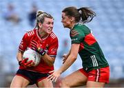 21 June 2025; Rosie Corkery of Cork in action against Saoirse Lally of Mayo during the TG4 All-Ireland Ladies Football Senior Championship Group 2 match between Mayo and Cork at Hastings Insurance MacHale Park in Castlebar, Mayo. Photo by Piaras Ó Mídheach/Sportsfile