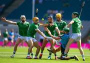 21 June 2025; Paddy Doyle of Dublin is tackled by Limerick players, from left, Cian Lynch, Adam English, Aidan O'Connor, Tom Morrissey and William O'Donoghue during the GAA Hurling All-Ireland Senior Championship quarter-final match between Dublin and Limerick at Croke Park in Dublin. Photo by John Sheridan/Sportsfile
