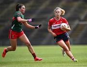 21 June 2025; Máire O'Callaghan of Cork gets away from Aoife Geraghty of Mayo during the TG4 All-Ireland Ladies Football Senior Championship Group 2 match between Mayo and Cork at Hastings Insurance MacHale Park in Castlebar, Mayo. Photo by Piaras Ó Mídheach/Sportsfile