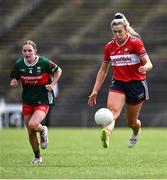 21 June 2025; Máire O'Callaghan of Cork gets away from Ciara Durkin of Mayo during the TG4 All-Ireland Ladies Football Senior Championship Group 2 match between Mayo and Cork at Hastings Insurance MacHale Park in Castlebar, Mayo. Photo by Piaras Ó Mídheach/Sportsfile