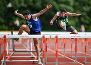 21 June 2025; Eddie Raicevic of St Augustine's, representing Munster, left, falls whilst competing in the boys 100m hurdles alongsideAaron  Whelan of St Peter's Dunboyne, representing Leinster, during the 123.ie Irish Schools Athletics Association Tailteann Games at SETU Campus in Carlow. Photo by Sam Barnes/Sportsfile