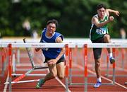 21 June 2025; Eddie Raicevic of St Augustine's, representing Munster, left, falls whilst competing in the boys 100m hurdles alongsideAaron  Whelan of St Peter's Dunboyne, representing Leinster, during the 123.ie Irish Schools Athletics Association Tailteann Games at SETU Campus in Carlow. Photo by Sam Barnes/Sportsfile