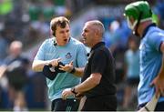21 June 2025; Dublin manager Niall Ó Ceallacháin in conversation with referee Liam Gordon at half-time of the GAA Hurling All-Ireland Senior Championship quarter-final match between Dublin and Limerick at Croke Park in Dublin. Photo by Ramsey Cardy/Sportsfile