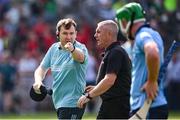 21 June 2025; Dublin manager Niall Ó Ceallacháin in conversation with referee Liam Gordon at half-time of the GAA Hurling All-Ireland Senior Championship quarter-final match between Dublin and Limerick at Croke Park in Dublin. Photo by Ramsey Cardy/Sportsfile