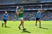 21 June 2025; David Reidy of Limerick in action against Andy Dunphy, left, and Brian Hayes of Dublin during the GAA Hurling All-Ireland Senior Championship quarter-final match between Dublin and Limerick at Croke Park in Dublin. Photo by Ramsey Cardy/Sportsfile