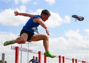21 June 2025; Eddie Raicevic of St Augustine's, representing Munster, loses his spike whilst competing in the boys 100m hurdles during the 123.ie Irish Schools Athletics Association Tailteann Games at SETU Campus in Carlow. Photo by Sam Barnes/Sportsfile