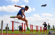 21 June 2025; Eddie Raicevic of St Augustine's, representing Munster, loses his spike whilst competing in the boys 100m hurdles during the 123.ie Irish Schools Athletics Association Tailteann Games at SETU Campus in Carlow. Photo by Sam Barnes/Sportsfile