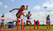 21 June 2025; Rachel Treacy of High Cross College Tuam, representing Connacht, second from left, on her way to winning the girls 80m hurdles during the 123.ie Irish Schools Athletics Association Tailteann Games at SETU Campus in Carlow. Photo by Sam Barnes/Sportsfile
