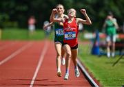 21 June 2025; Freya Renton of SH Westport, representing Connacht, celebrates winning the girls 3000m, ahead of Emma Hickey of St Mary's New Ross, representing Leinster, who finished second, during the 123.ie Irish Schools Athletics Association Tailteann Games at SETU Campus in Carlow. Photo by Sam Barnes/Sportsfile