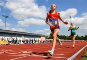 21 June 2025; Freya Renton of SH Westport, representing Connacht, crosses the line to win the girls 3000m, ahead of Emma Hickey of St Mary's New Ross, representing Leinster, who finished second, during the 123.ie Irish Schools Athletics Association Tailteann Games at SETU Campus in Carlow. Photo by Sam Barnes/Sportsfile