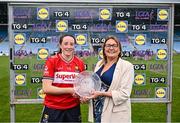 21 June 2025; Áine O'Sullivan of Cork receives the Player of the Match Award from LGFA President Trina Murray after the TG4 All-Ireland Ladies Football Senior Championship Group 2 match between Mayo and Cork at Hastings Insurance MacHale Park in Castlebar, Mayo. Photo by Piaras Ó Mídheach/Sportsfile
