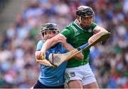 21 June 2025; Diarmaid Byrnes of Limerick in action against Sean Currie of Dublin during the GAA Hurling All-Ireland Senior Championship quarter-final match between Dublin and Limerick at Croke Park in Dublin. Photo by Ramsey Cardy/Sportsfile