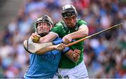 21 June 2025; Diarmaid Byrnes of Limerick in action against Sean Currie of Dublin during the GAA Hurling All-Ireland Senior Championship quarter-final match between Dublin and Limerick at Croke Park in Dublin. Photo by Ramsey Cardy/Sportsfile
