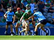 21 June 2025; William O'Donoghue of Limerick in action against Chris Crummey, left, and Brian Hayes of Dublin during the GAA Hurling All-Ireland Senior Championship quarter-final match between Dublin and Limerick at Croke Park in Dublin. Photo by Daire Brennan/Sportsfile