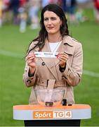 21 June 2025; Emer Gallagher of TG4 displays the name of Waterford during the draw for the TG4 All-Ireland Ladies Football Senior Championship Quarter-Finals after the TG4 All-Ireland Ladies Football Senior Championship Group 2 match between Mayo and Cork at Hastings Insurance MacHale Park in Castlebar, Mayo. Photo by Piaras Ó Mídheach/Sportsfile