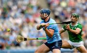 21 June 2025; John Hetherton of Dublin shoots to score his side's first goal despite the efforts of Sean Finn of Limerick during the GAA Hurling All-Ireland Senior Championship quarter-final match between Dublin and Limerick at Croke Park in Dublin. Photo by John Sheridan/Sportsfile