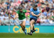 21 June 2025; Cian O'Sullivan of Dublin shoots to score his side's second goal despite the efforts of Barry Murphy of Limerick during the GAA Hurling All-Ireland Senior Championship quarter-final match between Dublin and Limerick at Croke Park in Dublin. Photo by John Sheridan/Sportsfile
