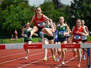 21 June 2025; Lucie Cawley of Mercy College Sligo, representing Connacht, left, on her way to winning the girls 1500m steeplechase during the 123.ie Irish Schools Athletics Association Tailteann Games at SETU Campus in Carlow. Photo by Sam Barnes/Sportsfile