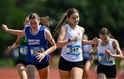 21 June 2025; Clara Casey of Lumen Christi College, representing Ulster, right, on her way to winning the girls 800m ahead of Faye Mannion of Colaiste Muire Ennis, representing Munster, left, who finished second, during the 123.ie Irish Schools Athletics Association Tailteann Games at SETU Campus in Carlow. Photo by Sam Barnes/Sportsfile
