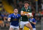 21 June 2025; David Clifford of Kerry in action against Niall Carolan of Cavan during the GAA Football All-Ireland Senior Championship preliminary quarter-final match between Kerry and Cavan at Fitzgerald Stadium in Killarney, Kerry. Photo by Brendan Moran/Sportsfile