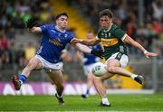 21 June 2025; David Clifford of Kerry in action against Niall Carolan of Cavan during the GAA Football All-Ireland Senior Championship preliminary quarter-final match between Kerry and Cavan at Fitzgerald Stadium in Killarney, Kerry. Photo by Brendan Moran/Sportsfile