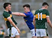 21 June 2025; Dara McVeety of Cavan tussles with David Clifford of Kerry during the GAA Football All-Ireland Senior Championship preliminary quarter-final match between Kerry and Cavan at Fitzgerald Stadium in Killarney, Kerry. Photo by Brendan Moran/Sportsfile
