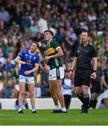 21 June 2025; David Clifford of Kerry, centre, Ciarán Brady of Cavan and referee Jerome Henry watch a shot by Clifford go over the bar during the GAA Football All-Ireland Senior Championship preliminary quarter-final match between Kerry and Cavan at Fitzgerald Stadium in Killarney, Kerry. Photo by Brendan Moran/Sportsfile
