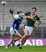 21 June 2025; David Clifford of Kerry is tackled by Niall Carolan of Cavan during the GAA Football All-Ireland Senior Championship preliminary quarter-final match between Kerry and Cavan at Fitzgerald Stadium in Killarney, Kerry. Photo by Brendan Moran/Sportsfile