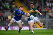 21 June 2025; David Clifford of Kerry in action against Niall Carolan of Cavan during the GAA Football All-Ireland Senior Championship preliminary quarter-final match between Kerry and Cavan at Fitzgerald Stadium in Killarney, Kerry. Photo by Brendan Moran/Sportsfile