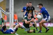 21 June 2025; Seán O'Brien of Kerry in action against Niall Carolan and Evan Crowe of Cavan during the GAA Football All-Ireland Senior Championship preliminary quarter-final match between Kerry and Cavan at Fitzgerald Stadium in Killarney, Kerry. Photo by Brendan Moran/Sportsfile