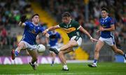 21 June 2025; David Clifford of Kerry in action against Niall Carolan of Cavan during the GAA Football All-Ireland Senior Championship preliminary quarter-final match between Kerry and Cavan at Fitzgerald Stadium in Killarney, Kerry. Photo by Brendan Moran/Sportsfile