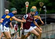 21 June 2025; Brian Concannon of Galway is tackled by Robert Doyle, left, and Peter McGarry of Tipperary during the GAA Hurling All-Ireland Senior Championship quarter-final match between Galway and Tipperary at TUS Gaelic Grounds in Limerick. Photo by Ray McManus/Sportsfile