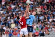 21 June 2025; Peadar Ó Cofaigh Byrne of Dublin and Colm O'Callaghan of Cork during the GAA Football All-Ireland Senior Championship preliminary quarter-final match between Dublin and Cork at Croke Park in Dublin. Photo by Ramsey Cardy/Sportsfile