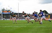 21 June 2025; Seán O'Shea of Kerry gets away from Dara McVeety of Cavan during the GAA Football All-Ireland Senior Championship preliminary quarter-final match between Kerry and Cavan at Fitzgerald Stadium in Killarney, Kerry. Photo by Brendan Moran/Sportsfile