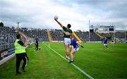 21 June 2025; Joe O'Connor of Kerry attempts to catch a kickout ahead of Ciarán Brady of Cavan during the GAA Football All-Ireland Senior Championship preliminary quarter-final match between Kerry and Cavan at Fitzgerald Stadium in Killarney, Kerry. Photo by Brendan Moran/Sportsfile