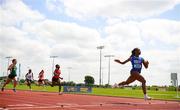 21 June 2025; Destiny Lawal of Castletroy College, representing Munster, right, on her way to winning the women's 100m during the 123.ie Irish Schools Athletics Association Tailteann Games at SETU Campus in Carlow. Photo by Sam Barnes/Sportsfile