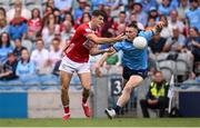 21 June 2025; Sean McDonnell of Cork in action against John Small of Dublin during the GAA Football All-Ireland Senior Championship preliminary quarter-final match between Dublin and Cork at Croke Park in Dublin. Photo by Ramsey Cardy/Sportsfile
