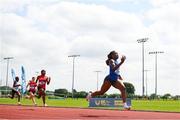 21 June 2025; Destiny Lawal of Castletroy College, representing Munster, right, on her way to winning the women's 100m during the 123.ie Irish Schools Athletics Association Tailteann Games at SETU Campus in Carlow. Photo by Sam Barnes/Sportsfile