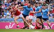 21 June 2025; Paul Walsh of Cork in action against Peadar Ó Cofaigh Byrne of Dublin during the GAA Football All-Ireland Senior Championship preliminary quarter-final match between Dublin and Cork at Croke Park in Dublin. Photo by Ramsey Cardy/Sportsfile