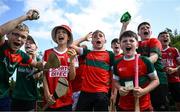 21 June 2025; Ballinora supporters react during the John West Féile na nGael Camogie and Hurling National Finals at Halo Tiles Wexford GAA Centre of Excellence in Ferns, Wexford. Photo by Shauna Clinton/Sportsfile