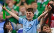 21 June 2025; Dublin supporter celebrates during the GAA Hurling All-Ireland Senior Championship quarter-final match between Dublin and Limerick at Croke Park in Dublin. Photo by John Sheridan/Sportsfile